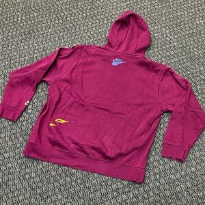 Nike MaroonPullover Hoodie with White Swoosh and Yellow Detail